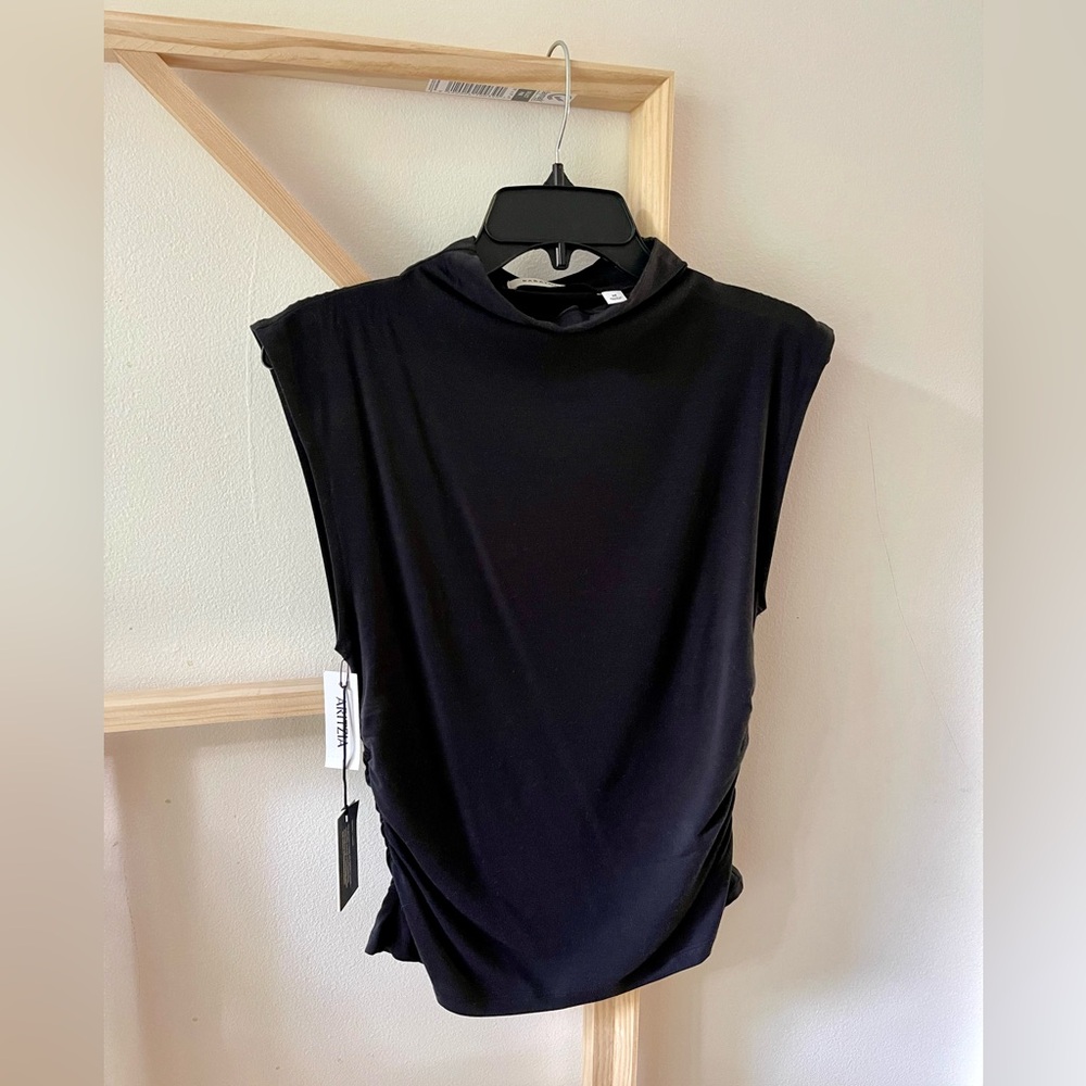 Aritzia black mock-neck sleeveless top with ruching on the sides
